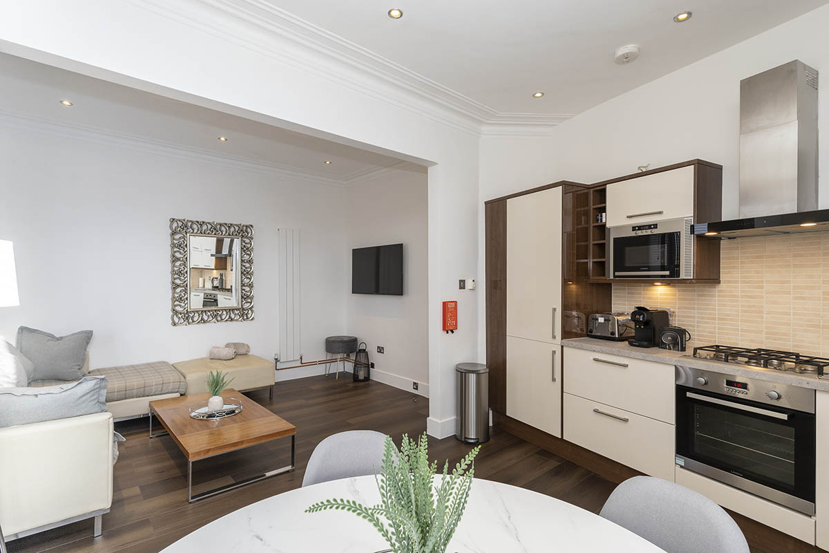 kitchen and living space at Howburn Residence three-bedroom apartment