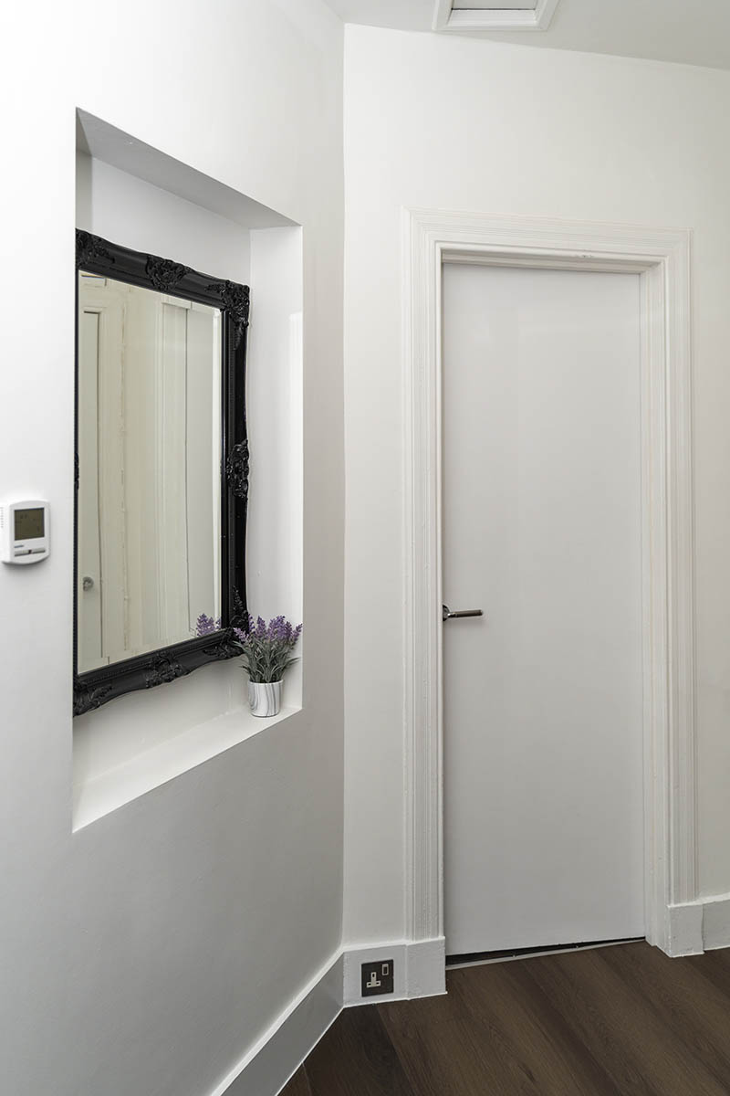 doorway and mirror at Howburn Residence three-bedroom apartment